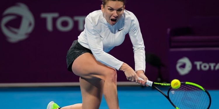 Simona Halep plays a backhand during her match against Elina Svitolina