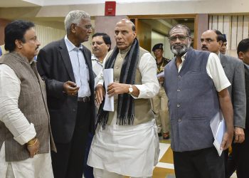 Home Minister Rajnath Singh talks with leaders of various political parties after the conclusion of the meeting, Saturday