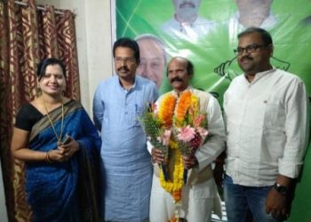 Koraput BJP vice-president Debandar Mohanthy (2nd from R) joins BJD in the presence of state sports minister Chandra Sarathi Behera (R), Wednesday