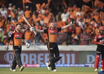 Jonny Bairstow raises his bat after reaching his century against Royal Challengers Bangalore at Rajiv Gandhi International Stadium in Hyderabad