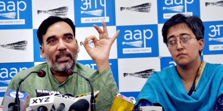 AAP leaders Gopal Rai (L) and Aitishi [Representational Photo] (PTI)