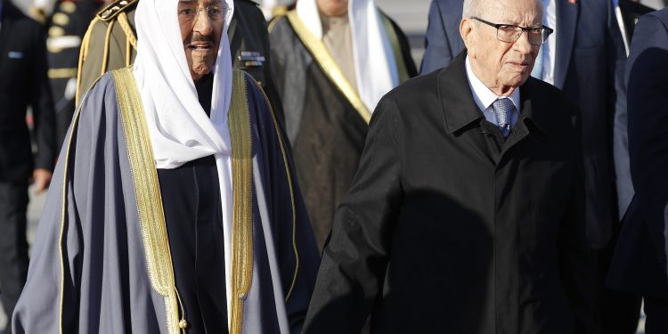 Tunis : Kuwait's Emir Sheikh Sabah Al-Ahmad Al- Jaber Al-Sabah, left, walks next of Tunisian President Beji Caid Essebsi, right, upon his arrival at Tunis-Carthage international airport to attend the Arab Summit, in Tunis, Tunisia, Saturday, March 30, 2019. AP/PTI(AP3_30_2019_000225B)