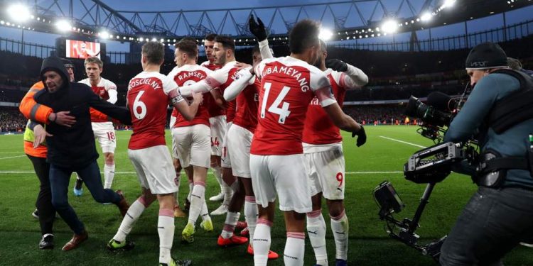 The incident occurred in the 69th min when a supporter ran on to the field to celebrate Aubameyang’s goal and shoved United defender Chris Smalling. (Image: Getty)