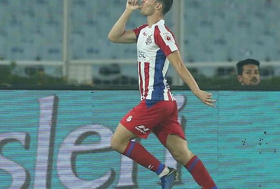 Edu Garcia celebrates after scoring the opener for ATK against Delhi Dynamos at Kolkata, Sunday