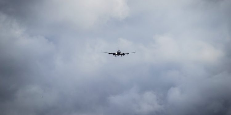 An Air Canada Boeing 737 Max aircraft arriving from Toronto prepares to land at Vancouver International Airport in Richmond, British Columbia on Tuesday, March 12, 2019. Canadian Transport Minister Marc Garneau says "all options are on the table" with regard to the country's fleet of Boeing 737 Max 8 aircraft but says the government currently has no plans to order the grounding of the plane. (Darryl Dyck/The Canadian Press via AP)