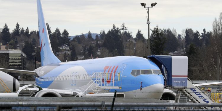 In this photo taken Monday, March 11, 2019, a Boeing 737 MAX 8 airplane being built for TUI Group sits parked at Boeing Co.'s Renton Assembly Plant in Renton, Wash. Britain, France and Germany on Tuesday joined a rapidly growing number of countries grounding the new Boeing plane involved in the Ethiopian Airlines disaster or turning it back from their airspace, while investigators in Ethiopia looked for parallels with a similar crash just five months ago. (AP)