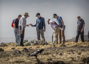 Foreign investigators examine wreckage at the scene where the Ethiopian Airlines Boeing 737 Max 8 crashed shortly after takeoff on Sunday killing all 157 on board, near Bishoftu, or Debre Zeit, south of Addis Ababa, in Ethiopia Tuesday, March 12, 2019. Ethiopian Airlines had issued no new updates on the crash as of late afternoon Tuesday as families around the world waited for answers, while a global team of investigators began picking through the rural crash site. (AP)