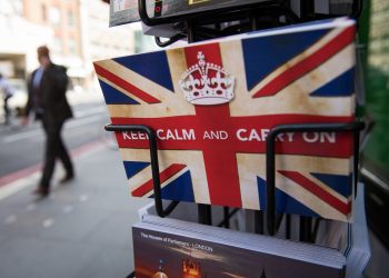 Postcards featuring the World War II British slogan "Keep Calm and Carry On" are seen outside a newsagents in London, on 24 June, 2016. 
Three years after a referendum in which Britain voted to leave the European Union, the country is gripped by painful uncertainty over how -- or even whether -- it should put an end to its 46-year membership (AFP)