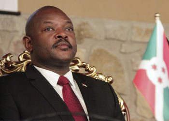 The girls are accused of defacing photographs of Nkurunziza (pictured) in five textbooks belonging to their school. (Image: Reuters)