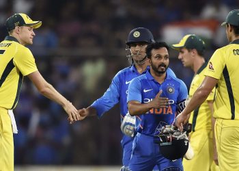 Australian players congratulate Kedar Jadhav and MS Dhoni after their match-winning partnership helped India clinch victory if the first ODI