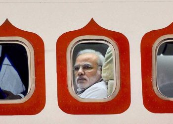 A 2014 file photo of Prime Minister Narendra Modi in his special aircraft as he arrived at the Brasilia International Airport in Brazil. (PTI)