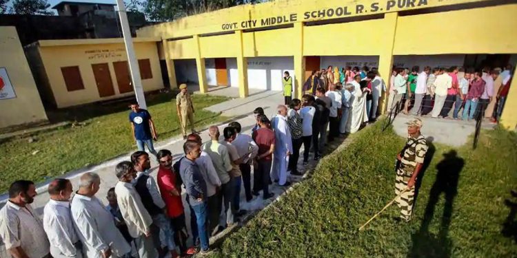 People wait in queues to cast their votes for municipal elections in Ranbir Singh Pura near Jammu, Oct 10, 2018 (PTI) [Representative photo]