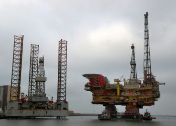 The five biggest publicly listed oil and gas majors made profits of $55 billion in 2018 (AFP)