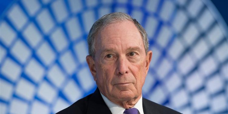 In this file photo taken on April 19, 2018, former New York City Mayor and founder of Bloomberg Philanthropies Mike Bloomberg speaks with IMF Managing Director Christine Lagarde during the The International Monetary Fund and the World Bank Group 2018 Spring Meetings in Washington, DC. (AFP)
