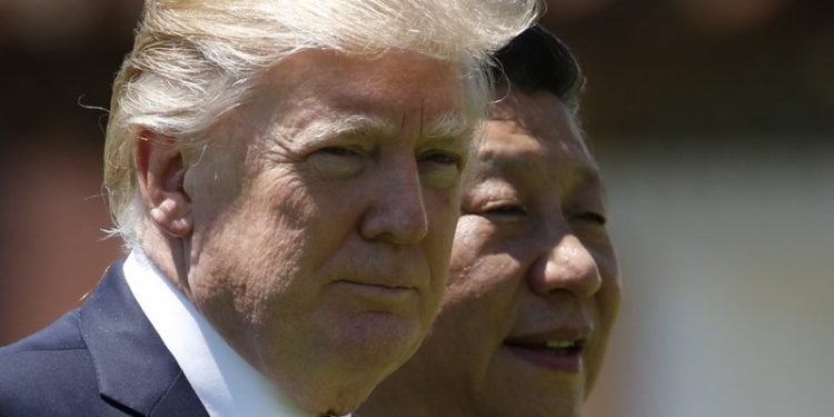 In this photo taken April 7, 2017, file photo, U.S. President Donald Trump, left, and Chinese President Xi Jinping walk together at Mar-a-Lago in Palm Beach, Fla. Foreign leaders showered President Donald Trump and his family with more than $140,000 in gifts during their first year in the White House, with China and Saudi Arabia among the most lavish givers. China’s president gave Trump and his wife the two most expensive gifts in 2017: a $14,400 calligraphy display and a $16,250 dinnerware set featuring Trump’s Mar-a-Lago resort. All gifts were turned over to the National Archives. (AP)