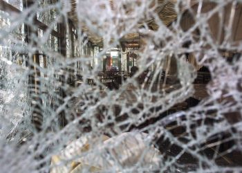 The inside view of the famed tea salon Laduree pictured through smashed windows the day after it was vandalized during the 18th straight weekend of demonstrations by the yellow vests, in Paris, France, Sunday, March 17, 2019. Paris cleaned up one of the world's most glamorous avenues Saturday after resurgent rioting by yellow vest protesters angry at President Emmanuel Macron stunned the nation. (AP Photo/Rafael Yaghobzadeh)