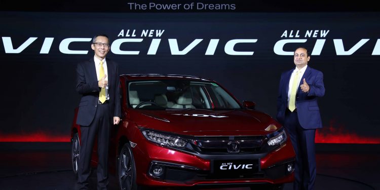 Gaku Nakanishi, President & CEO (Left) and Rajesh Goel, Sr Vice President & Director, HCIL at the launch of All-New 10th Generation Honda Civic in India, in New Delhi