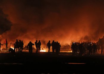 Palestinians in Gaza had thrown a number of explosive devices toward the border fence with Israel, one of which set off air raid sirens in the south of the country late Saturday.