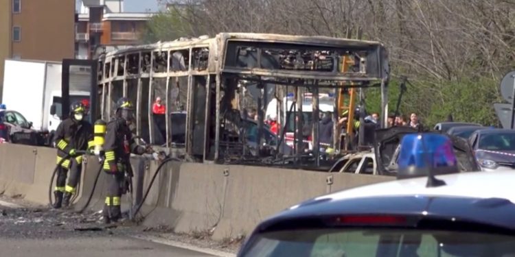hotos showed the burnt-out shell of the bus and the car, which were travelling on a road near Milan.