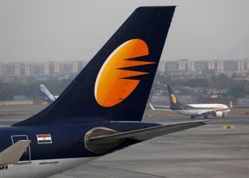 FILE PHOTO: A Jet Airways plane is parked as other moves to runway at the Chhatrapati Shivaji International airport in Mumbai, India, February 14, 2018. (REUTERS)