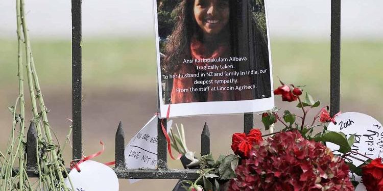 Tribute of a victim of mosque shooting, Ancia Alibava from Kerala, hangs on a wall at the Botanical Gardens in Christchurch, New Zealand. (AP)
