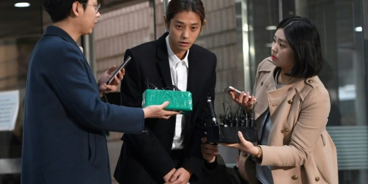 Jung (C) appeared at the court for a hearing hours earlier and said he had "committed unforgivable crimes" (AFP)