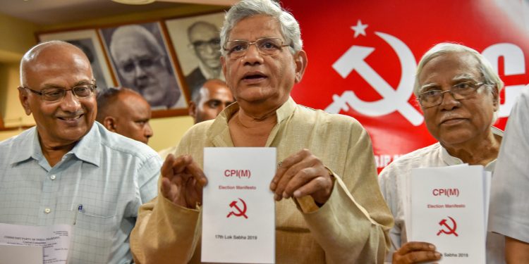New Delhi: CPI(M) General Secretary Sitaram Yechury releases party's manifesto for the upcoming Lok Sabha elections at a press conference, in New Delhi, Thursday, March 28, 2019. (PTI Photo/Subhav Shukla) (PTI3_28_2019_000033B)