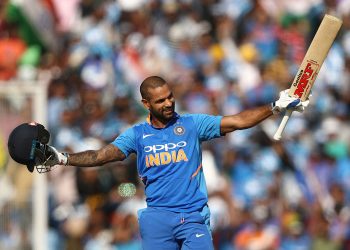 Shikhar Dhawan acknowledges the applause of the crowd after scoring his century against Australia in Mohali, Sunday