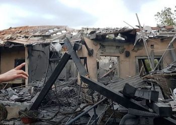 The house hit was located in the community of Mishmeret, police said. Medics said they were treating one Israeli with moderate wounds and four others injured lightly.