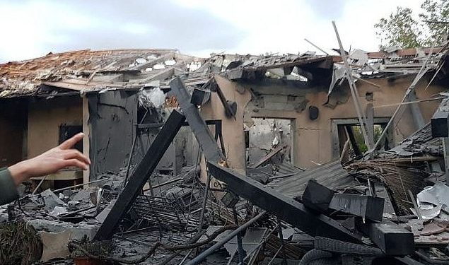 The house hit was located in the community of Mishmeret, police said. Medics said they were treating one Israeli with moderate wounds and four others injured lightly.