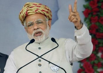 Surendranagar: Prime Minister Narendra Modi addresses an election campaign rally for the state assembly election in Surendranagar on Sunday. PTI [Representational Image]