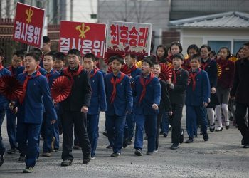 Children march to encourage voters to cast their ballots during voting for the Supreme People’s Assembly elections, in Pyongyang 10 March 2019 (AFP)