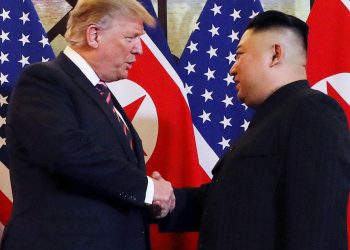President Donald Trump and North Korean leader Kim Jong Un shake hands to start their summit in Hanoi, Vietnam, February 27