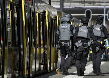 Armed police and emergency services swarmed the scene after the shooting in the city of Utrecht (AFP)