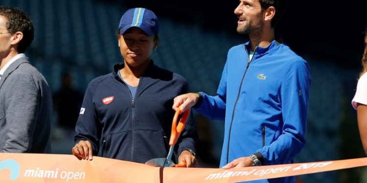 Naomi Osaka and Serbian star Novak Djokovic took part in a ribbon cutting ceremony Wednesday at the Miami Open (AFP)