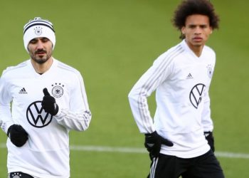 Ikay Gundogan (left) and Leroy Sane were subjected to racial slurs during Germany's friendly against Serbia Wednesday.