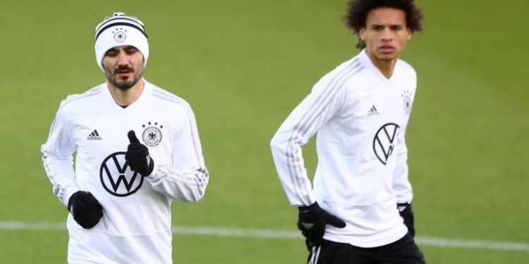 Ikay Gundogan (left) and Leroy Sane were subjected to racial slurs during Germany's friendly against Serbia Wednesday.