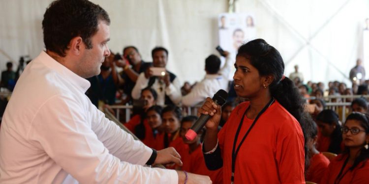 Rahul Gandhi interacts with a delegate attending the convention in Jeypore, Friday   Photo@Congress Twitter