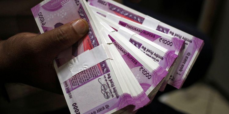 Rupee slips 11 paise against dollar in early trade