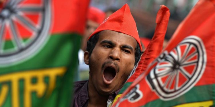 A SP worker and supporter is sloganeering at an election campaign. (AFP)