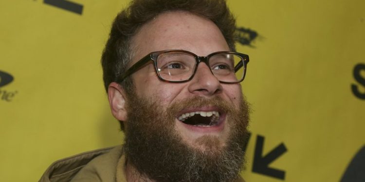 In this March 12, 2017, file photo, Seth Rogen arrives for "The Disaster Artist" at the Paramount Theatre during the South by Southwest Film Festival in Austin, Texas. Rogen became an honorary member of the Pi Kappa Alpha fraternity chapter at the University of Vermont on April 17, 2017. (AP)