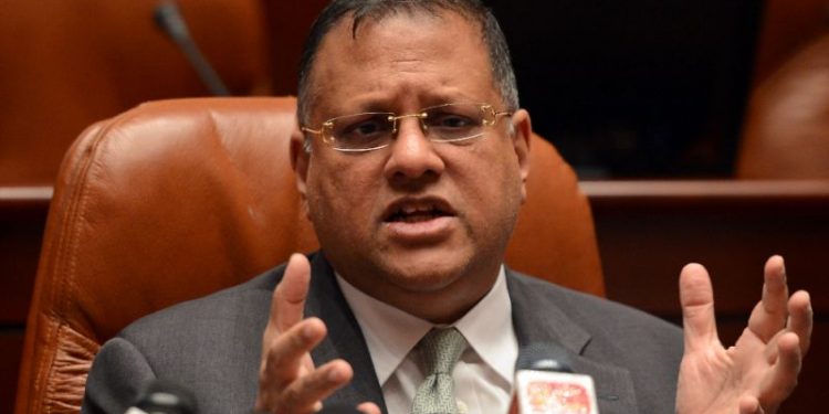 Former Sri Lanka central bank governor Arjuna Mahendran is wanted by Colombo to face charges related to a $74 million insider trading scandal (AFP)
