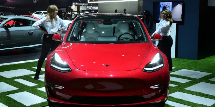 Tesla's Model 3 "standard" version costing $35,000 goes on sale, fulfilling the vision of company founder Elon Musk of making an electric car for the mass market (AFP)