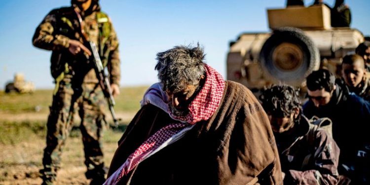 The Kurdish-led Syrian Democratic Forces are holding hundreds of alleged jihadists and relatives (AFP)