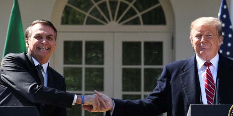 Hosting President Jair Bolsonaro at the White House March 19, 2019, President Donald Trump said relations with Brazil have "never been closer" (AFP)