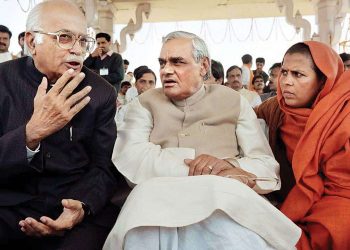 Veteran BJP leader LK Advani chats with former Prime Minister Atal Bihari Vajpayee as Uma Bharti looks on (PTI)