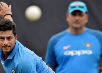  Kuldeep Yadav with India coach Ravi Shastri in the background (PTI)
