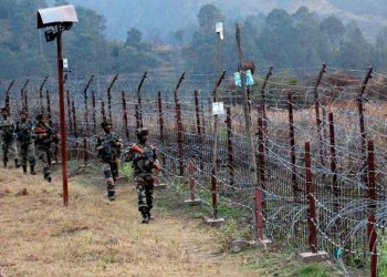 Poonch: Indian Army Soldiers stand guard near the Line of Control (LoC) in Poonch after One person was killed and many others injured in cross border firing between Indian and Pakistani troops on Thursday. PTI Photo(PTI6_3_2017_000079A)