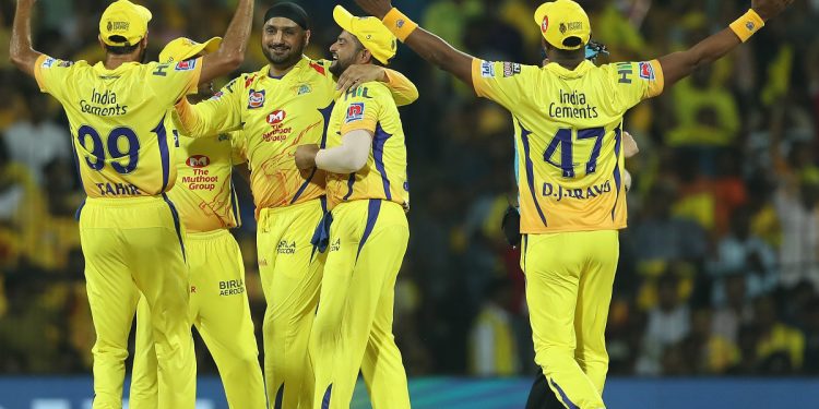 CSK players celebrate with Harbhajan Singh (centre) after the dismissal of Virat Kohli, Saturday