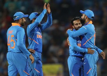 Kedar Jadhav celebrates taking the wicket of Usman Khawaja during the second ODI at Nagpur